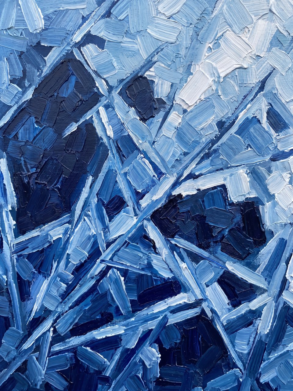 Frost crystals across a steel plate, painted in blue planes